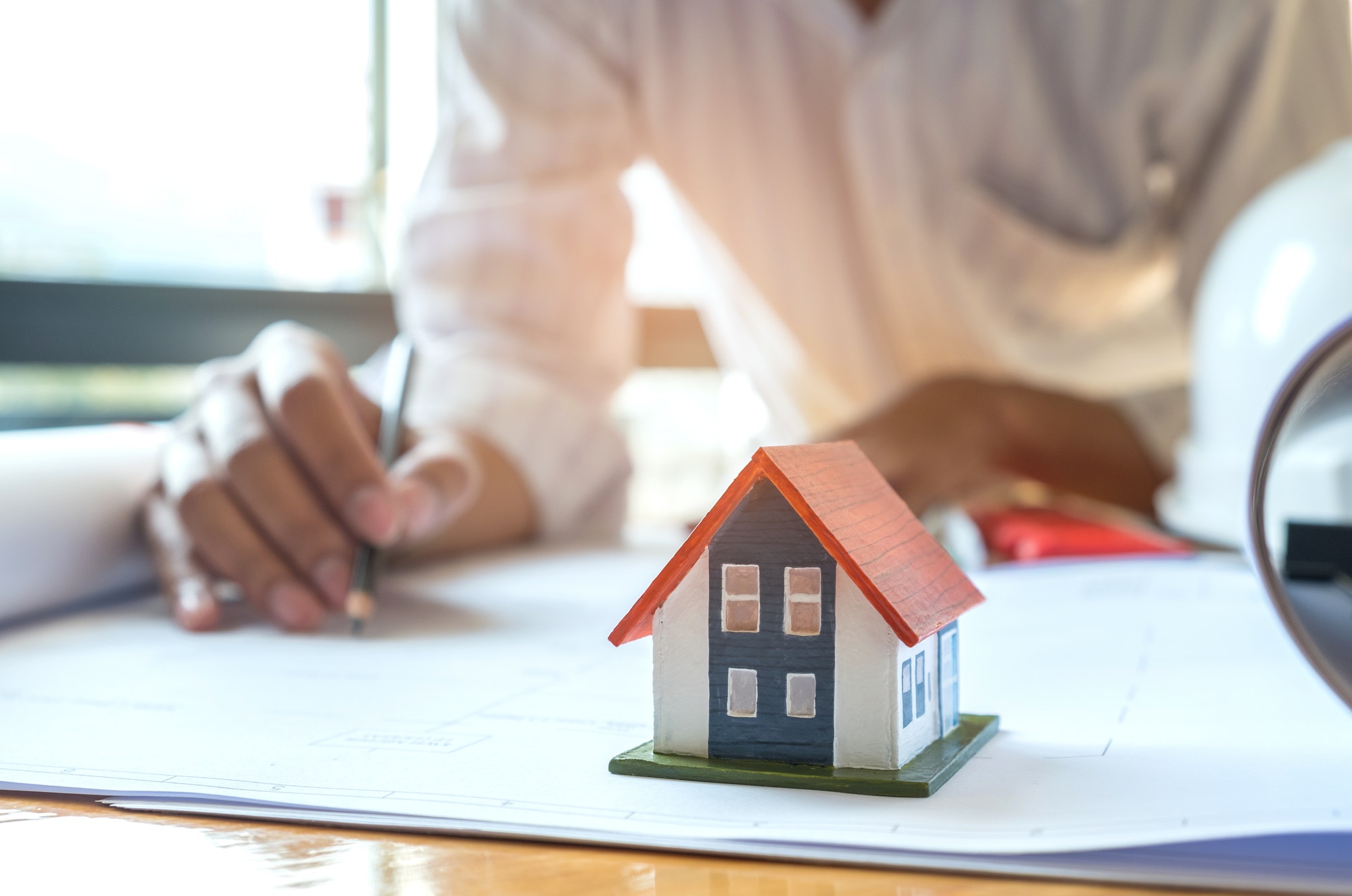 Home design concept,Architects are writing home plan.